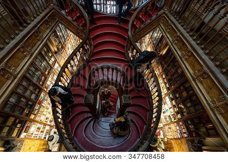 Porto, Portugal - January 20, 2020: Crowds Of Tourists Visit The Famous Bookstore Of Livraria Lello 