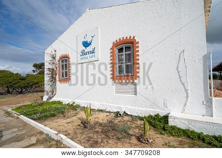 Tavira, Portugal - January 23, 2020: Exterior Sign For The Barril Beach Cafe, Along Praia Do Barril 