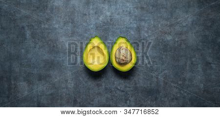 Fresh Avocado Is Cut In Half. They're High In The Healthy Kind Of Fats