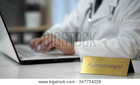 Pulmonologist Prescribing Medication To Treat Asthma, Filling Out Medical Forms