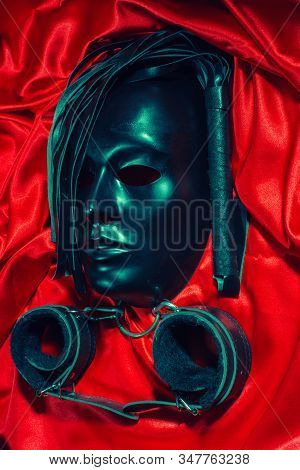Bondage, Kinky Adult Sex Games, Kink And Bdsm Lifestyle Concept With A Mask, Pair Of Leather Handcuf