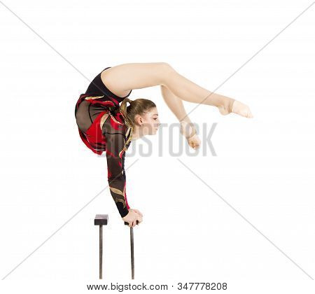 Beautiful Equilibrist In A Red And Black Suit, Performs Exercises On Acrobatic Canes.