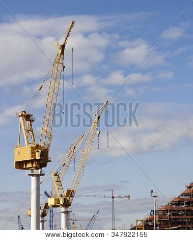 Yellow Cranes In The Shipyard For Ships Construction In Vigo, Pontevedra, Spain