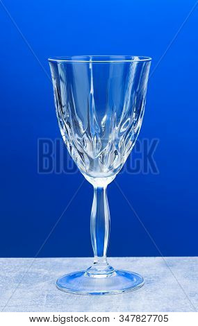 Crystal Glass With Close-up On A Blue Background
