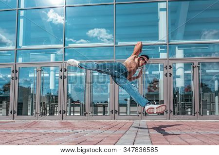 Man In A Jump On Twine, Muscular Torso, Dancer, Young Guy, City Summer, Dancing Street Dances, Moder
