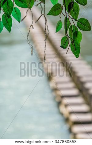 Defocused Water Crossing Stepping Stones On Tuo River, Flowing Through The Centre Of Fenghuang Old T
