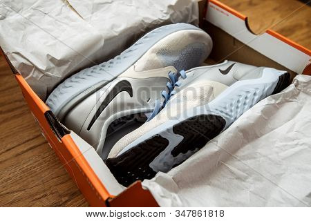 Paris, France - Sep 23, 2019: Black Friday Sale Gift On Wooden Table Pair Of New Nike Female Running