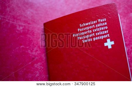  swiss passport on red background