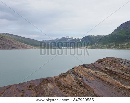 Scenic Austerdalsvatnet Lake Landscapes Near European Svartisen Glacier In Nordland County In Norway