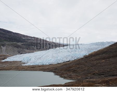 Austerdalsvatnet Lake Landscapes And Great European Svartisen Glacier In Nordland County In Norway, 