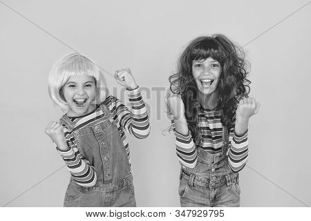 Sisters Having Fun. Semi Permanent Color Cream. Colored Clip In Hair Extensions. Change Color. Kids 