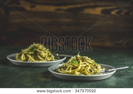 Spaghetti Pasta Bucatini With Pesto Sauce And Parmesan. Italian Traditional Perciatelli Pasta By Gen