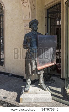 Tbilisi, Georgia, October 14, 2019 : Bronze Sculpture Of A Standing Chef With A Menu In His Hands On
