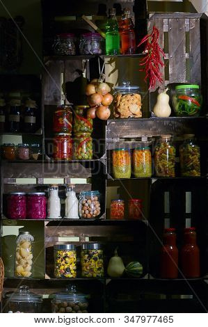 Fall Pantry With Jars And Pickled Vegetables