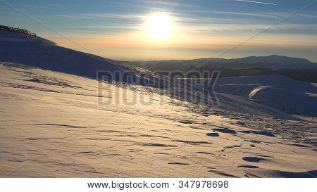 Blizzard In Mountains At Sunset, Winter View, Alpine Landscape, Ski Resort
