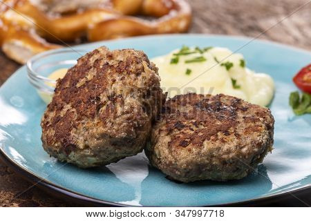Two Bavarian Meat Loafs On A Plate