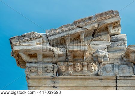 Fragment Of The Entablature Of The Ruined Temple Of Apollo In Side With A Stone-cut Relief On The Fr