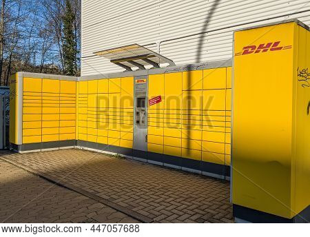 Dhl Packstation For Pick Up And Sending Parcels - City Of Saarbruecken, Germany - January 24, 2022