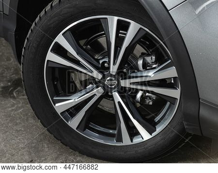 Novosibirsk, Russia - January    11, 2022:  Nissan Qashqai, Car Wheel On Gray  Car - Close Up