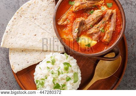 Hilachas Is A Staple Of Guatemalan Cuisine, A Red Colored Stew Featuring Ingredients Such As Shredde