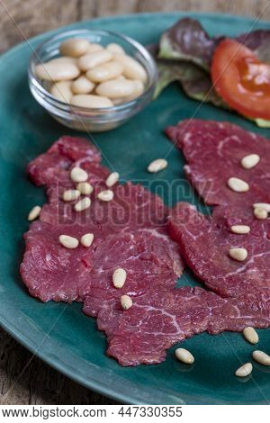 Italian Carne Salada On A Green Plate