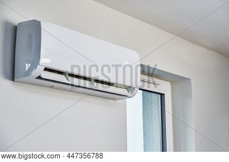 Adjusting Temperature On Air Conditioner, Working Air Conditioner For Comfort Temperature In Home At
