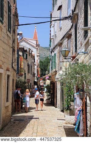 Trogir, Croatia - June 23, 2021: Tourists Visit Old Town Of Trogir, Croatia. Trogir Is A Medieval To