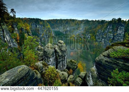 Saxon Switzerland Rathen Bastei - Rathener Kessel - Sandstone Rock Formations Autumn Forest Clouds M