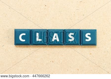 Tile Alphabet Letter In Word Class On Wood Background