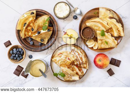 Celebrating Pancake Day, Healthy Breakfast. Homemade Sweet Crepes With Blueberries, Ricotta, Apples,