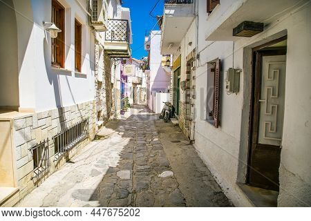 Skiathos, Greece- Avg 10, 2019. Street with  traditional house  in Skiathos Town, Greece. Europe.