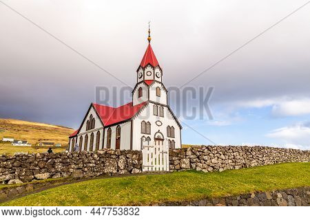 View Of The Sandavags Kirkja, Church In Sandavagur On Vagar Island. A Small Village Situated On The 