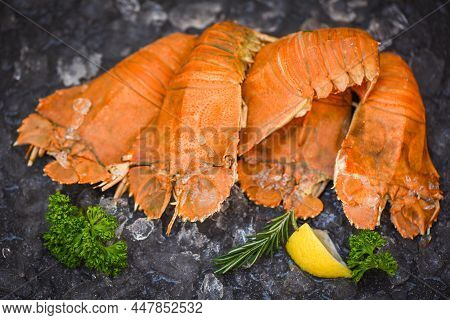 Flathead Lobster Shrimps On Ice, Fresh Slipper Lobster Flathead Boiled For Cooking With Lemon Parsle