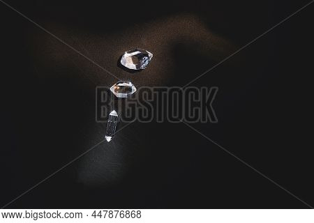 Three Specimens Of Bi-terminated Hyaline Quartz Illuminated By Lights Of A Different Color