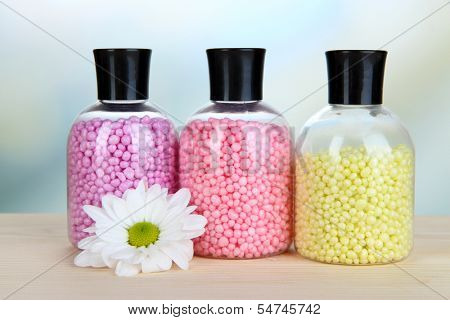 Aromatherapy minerals - colorful bath salt on light background