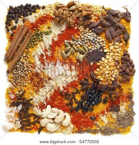 A huge range of indian spices and other ingredients, including black cardamom, chilli, black chickpeas, cashew nuts and walnuts, black (soy) beans, cloves, fenugreek powder, mustard seeds, etc