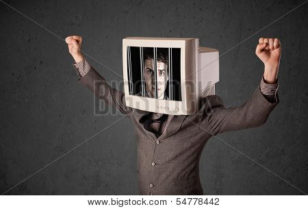 Business man with monitor screen on his head traped into a digital system concept