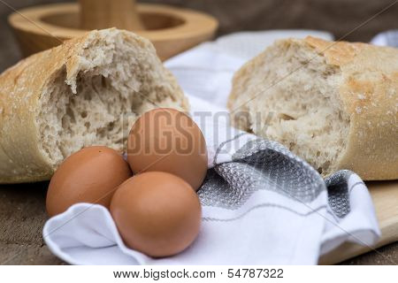Loaf Of Sourdough Bread In Rustic Kitchend Setting