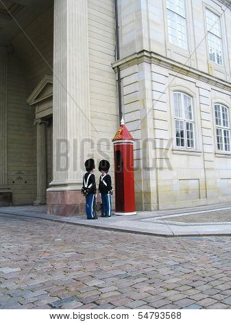 Royal Guard guarding Amalienborg Castle in Copenhagen, Denmark