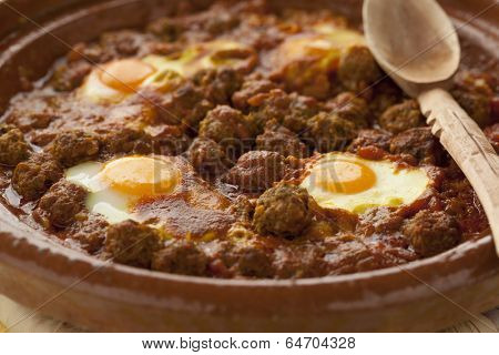  Moroccan kefta tagine with eggs (Mkaouara) close up