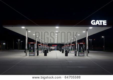 JACKSONVILLE, FL - MAY 8, 2014: A Gate Petroleum gas station at night in Jacksonville. Gate Petroleum is headquartered in Jacksonville and has over 225 gas stations with over 2,200 employees.