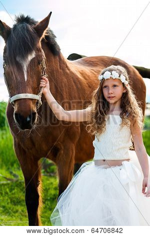 Girl In White Dress Leading Horse.