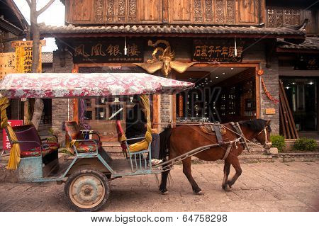 Carriage Service For Torists In Shuhe Ancient Town.