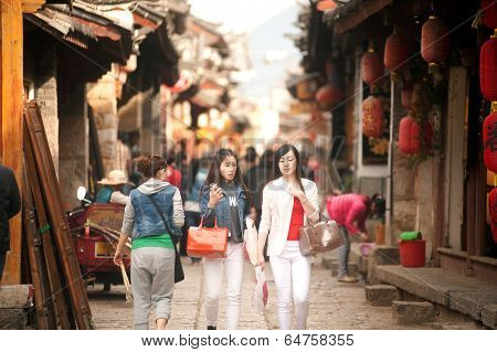 Crowd Walking In Shuhe Ancient Town.