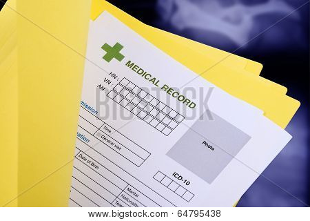 Blank Medical Record In Yellow Folder.