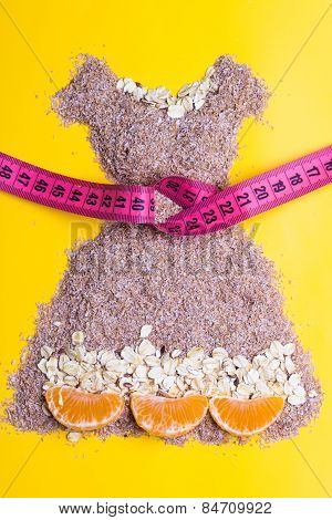 Dress Shape Made From Bran With Measure Tape