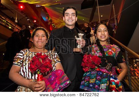 BERLIN, GERMANY - FEBRUARY 14: M. Telon, director J. Bustamante, M. M. Coroy . Closing Ceremony. 65th Berlinale International Film Festival at Berlinale Palace on February 14, 2015 in Berlin, Germany.