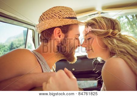 Hipster couple on road trip on a summers day