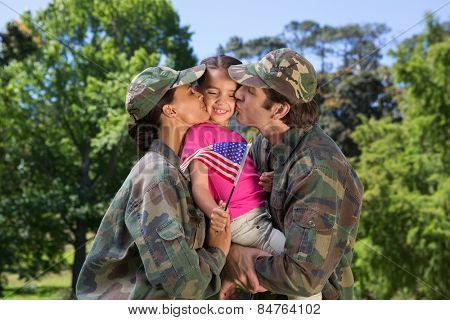 Army parents reunited with their daughter on a sunny day