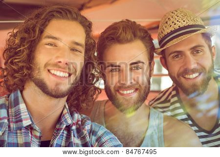 Hipster friends on road trip on a summers day